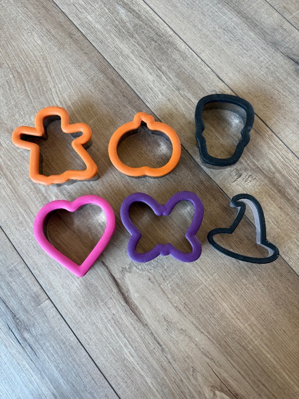 Assorted large cookie cutters, five metal and silicone, one plastic
